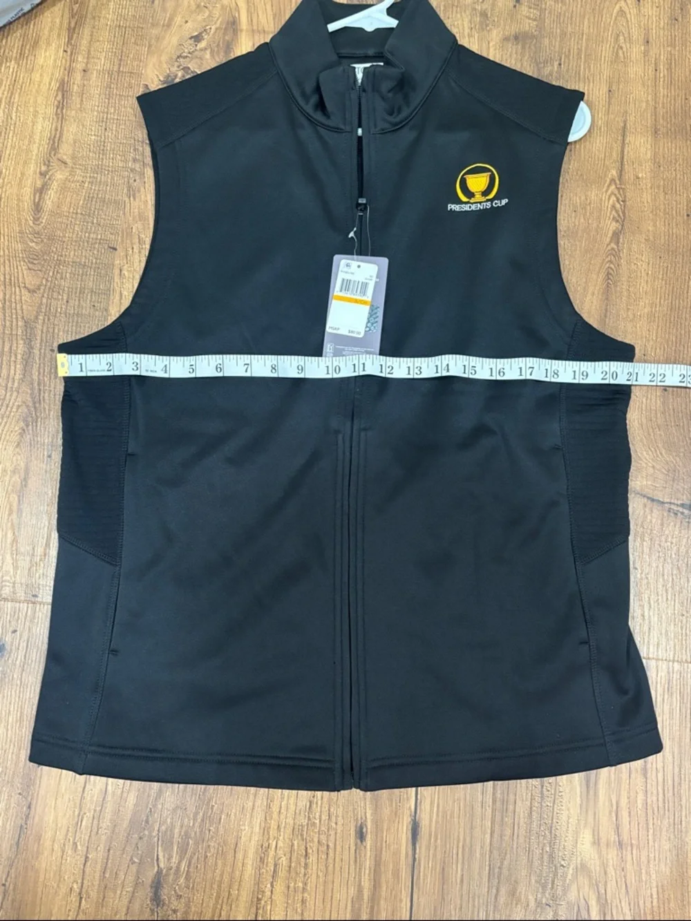 PGA TOUR Black Presidents Cup Sleeveless Zip Vest with Yellow Logo